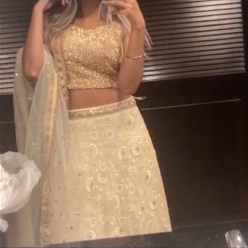 White cream lengha with golden blouse size small